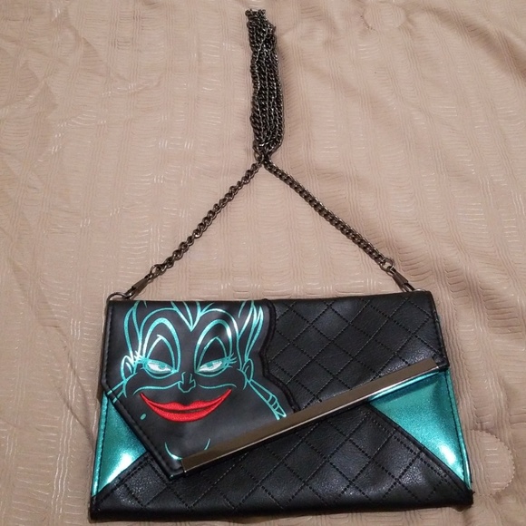 Disney Handbags - SALE Ursula Clutch w Chain